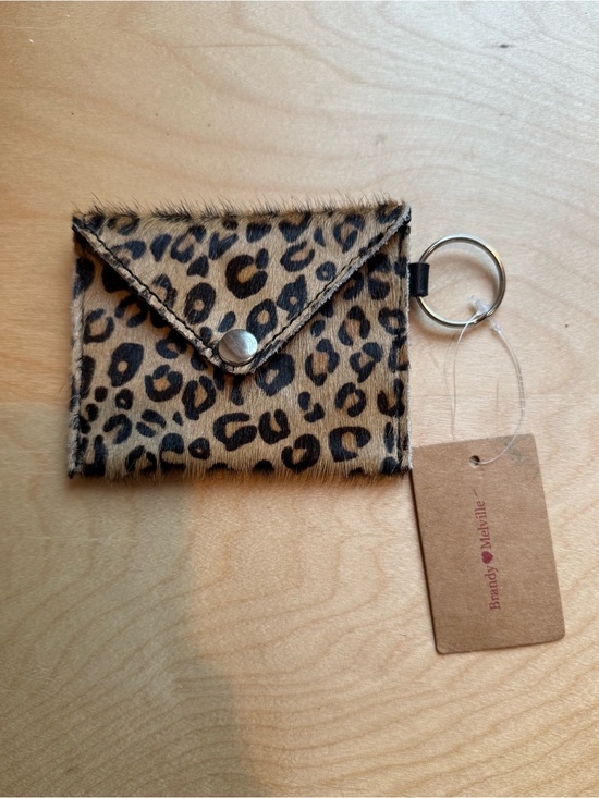 Brandy Melville Handbags - NWT Brandy Melville Leopard Print Faux Fur Wallet